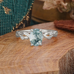 Artistic Twisted Shank Oval Cut Moss Agate Engagement Ring