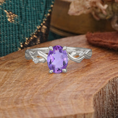 Artistic Twisted Shank Oval Cut Amethyst Engagement Ring