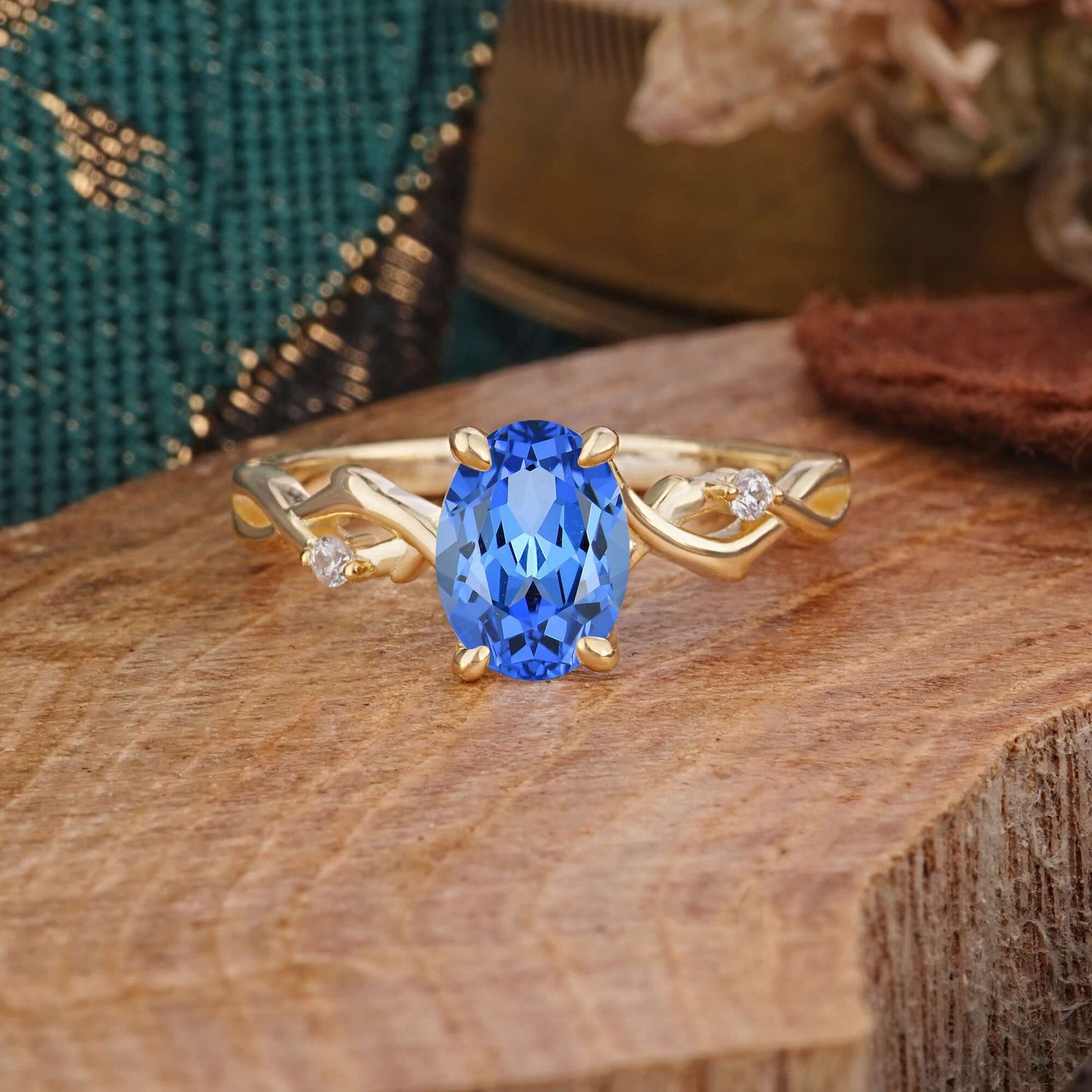 Artistic Twisted Shank Oval Cut Sapphire Engagement Ring - Romalar Jewelry