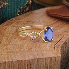 Artistic Twisted Shank Oval Cut Tanzanite Engagement Ring