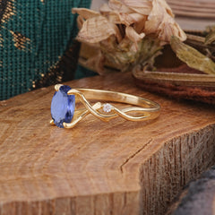 Artistic Twisted Shank Oval Cut Tanzanite Engagement Ring