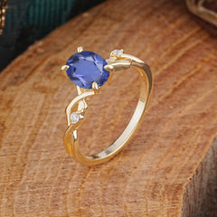 Artistic Twisted Shank Oval Cut Tanzanite Engagement Ring