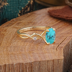 Artistic Twisted Shank Oval Cut Turquoise Engagement Ring