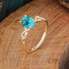 Artistic Twisted Shank Oval Cut Turquoise Engagement Ring