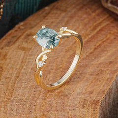 Artistic Twisted Shank Oval Cut Moss Agate Engagement Ring