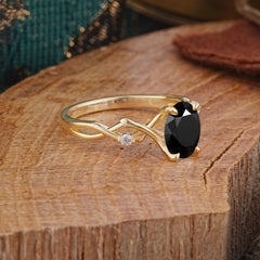 Artistic Twisted Shank Oval Cut Black Onyx Engagement Ring