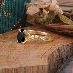 Artistic Twisted Shank Oval Cut Black Onyx Engagement Ring