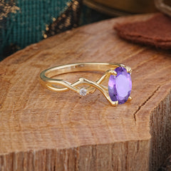 Artistic Twisted Shank Oval Cut Amethyst Engagement Ring