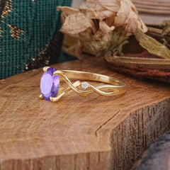 Artistic Twisted Shank Oval Cut Amethyst Engagement Ring