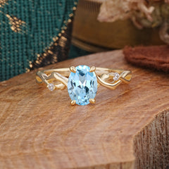 Artistic Twisted Shank Oval Cut Aquamarine Engagement Ring