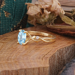 Artistic Twisted Shank Oval Cut Aquamarine Engagement Ring