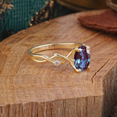 Artistic Twisted Shank Oval Cut Alexandrite Engagement Ring