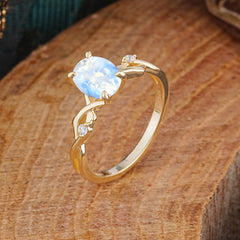 Artistic Twisted Shank Oval Cut Moonstone Engagement Ring