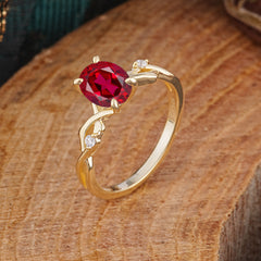 Artistic Twisted Shank Oval Cut Ruby Engagement Ring