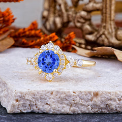 Luxury 4-Prong Round Cut Sapphire Engagement Ring