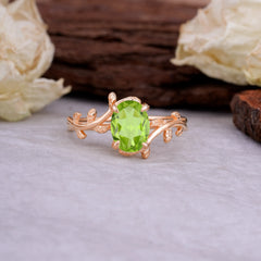 Nature Inspired 4 Prong Oval Cut Peridot Wedding Ring
