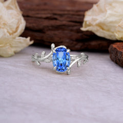 Nature Inspired 4 Prong Oval Cut Sapphire Wedding Ring