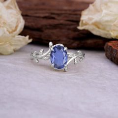 Nature Inspired 4 Prong Oval Cut Tanzanite Wedding Ring
