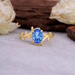 Nature Inspired 4 Prong Oval Cut Sapphire Wedding Ring
