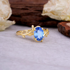 Nature Inspired 4 Prong Oval Cut Sapphire Wedding Ring