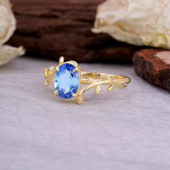 Nature Inspired 4 Prong Oval Cut Sapphire Wedding Ring