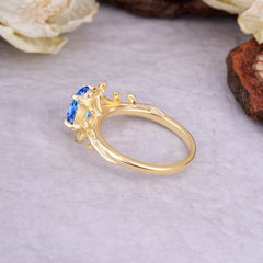 Nature Inspired 4 Prong Oval Cut Sapphire Wedding Ring