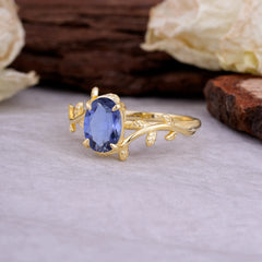 Nature Inspired 4 Prong Oval Cut Tanzanite Wedding Ring
