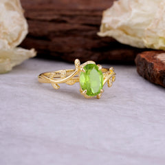 Nature Inspired 4 Prong Oval Cut Peridot Wedding Ring