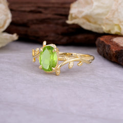 Nature Inspired 4 Prong Oval Cut Peridot Wedding Ring