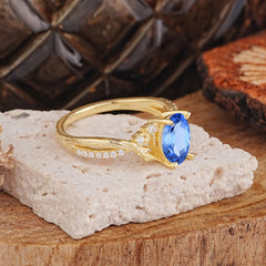 Nature Inspired 4 Prong Golden Vine Oval Cut Sapphire Ring