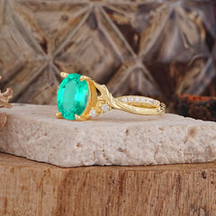 Nature Inspired 4 Prong Golden Vine Oval Cut Emerald Ring