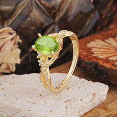 Nature Inspired 4 Prong Golden Vine Oval Cut Peridot Ring