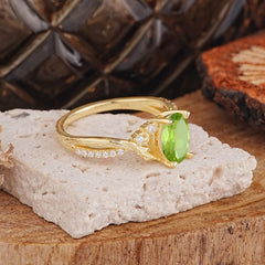 Nature Inspired 4 Prong Golden Vine Oval Cut Peridot Ring