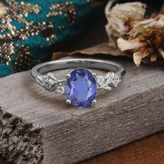 4 Prong Oval Tanzanite Gold Ring for Timeless Love
