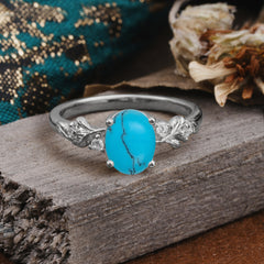 4 Prong Oval Turquoise Gold Ring for Timeless Love