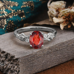 4 Prong Oval Garnet Gold Ring for Timeless Love
