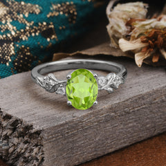4 Prong Oval Peridot Gold Ring for Timeless Love
