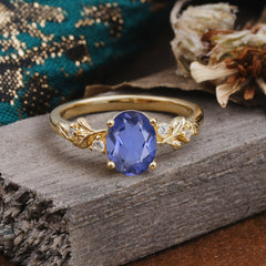 4 Prong Oval Tanzanite Gold Ring for Timeless Love