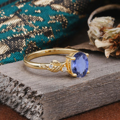 4 Prong Oval Tanzanite Gold Ring for Timeless Love
