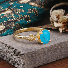 4 Prong Oval Turquoise Gold Ring for Timeless Love