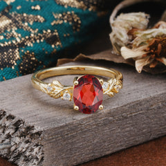 4 Prong Oval Garnet Gold Ring for Timeless Love