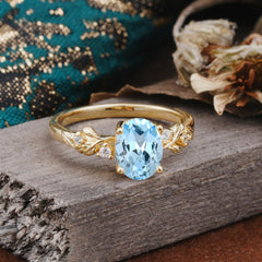 4 Prong Oval Aquamarine Gold Ring for Timeless Love