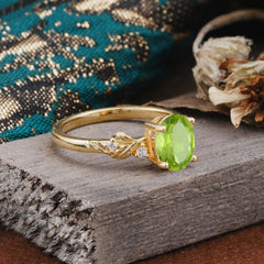 4 Prong Oval Peridot Gold Ring for Timeless Love