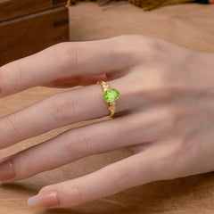 4 Prong Oval Peridot Gold Ring for Timeless Love
