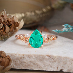 Romantic 4-Prong Pear-Cut Emerald Engagement Ring
