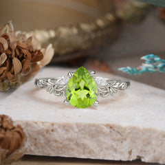 Romantic 4-Prong Pear-Cut Peridot Engagement Ring