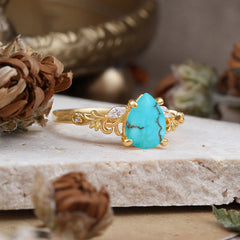 Romantic 4-Prong Pear-Cut Turquoise Engagement Ring