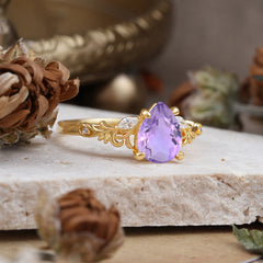 Romantic 4-Prong Pear-Cut Amethyst Engagement Ring