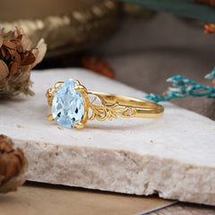 Romantic 4-Prong Pear-Cut Aquamarine Engagement Ring