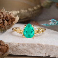 Romantic 4-Prong Pear-Cut Emerald Engagement Ring